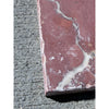 Crema Marrfil Rustic Modern Tumbled reddish-pink marble tile with white veining on gray concrete