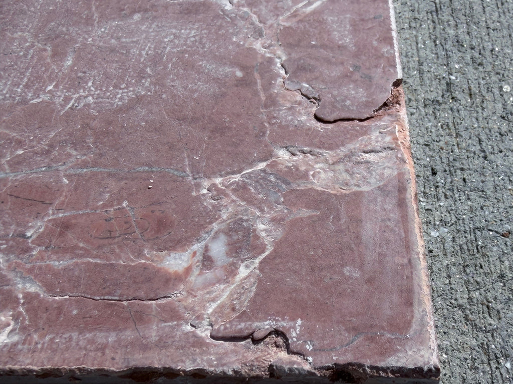 Crema Marrfil Rustic Modern Tumbled reddish-brown stone slab with cracks