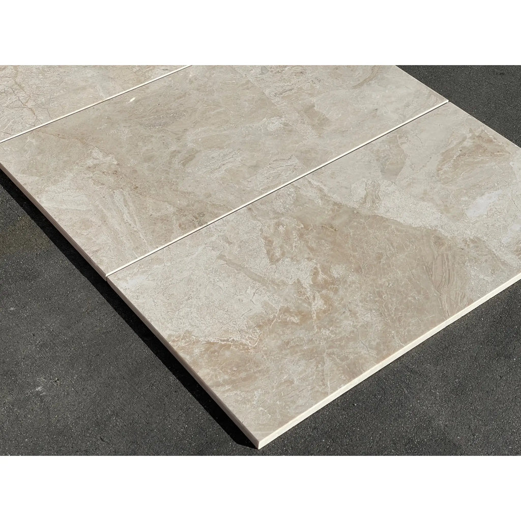 Beige marble-effect ceramic floor tiles with subtle veining and a glossy finish in diano royal queen beige 12x24 design