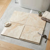Four square beige marble effect diano royal queen beige bathroom floor tiles with a glossy polished finish arranged in grid