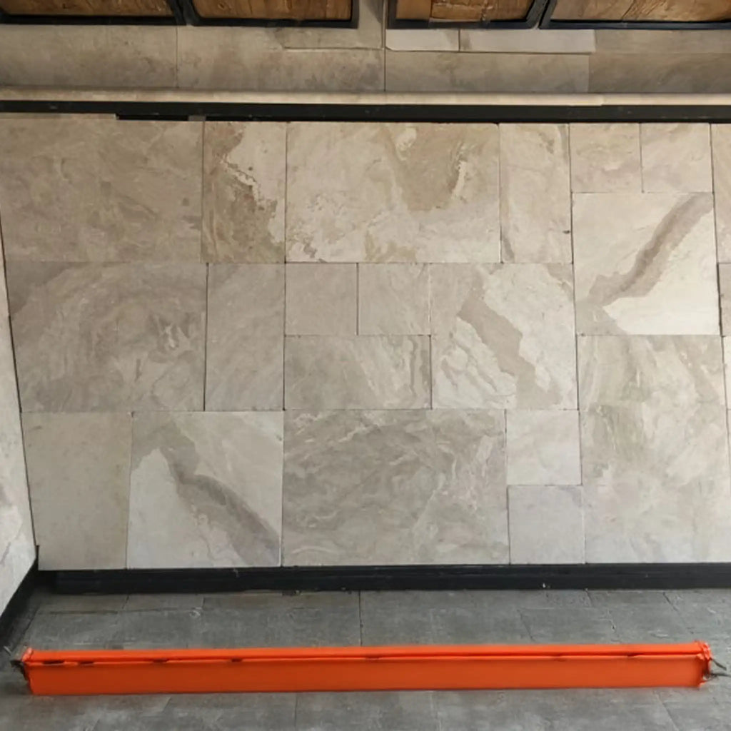 Bright orange metal track on floor for Diano Royal Queen Beige Marble Versailles set