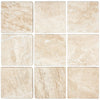 Nine beige Diano Royal Queen Beige Marble 4X4 Tumbled tiles arranged for display