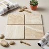 Four square beige diano royal queen beige marble 6x6 tumbled tiles with natural stone veining arranged in a grid