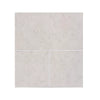 Light gray Dolce Crema 12x12 limestone marble-effect square tiles with subtle veining