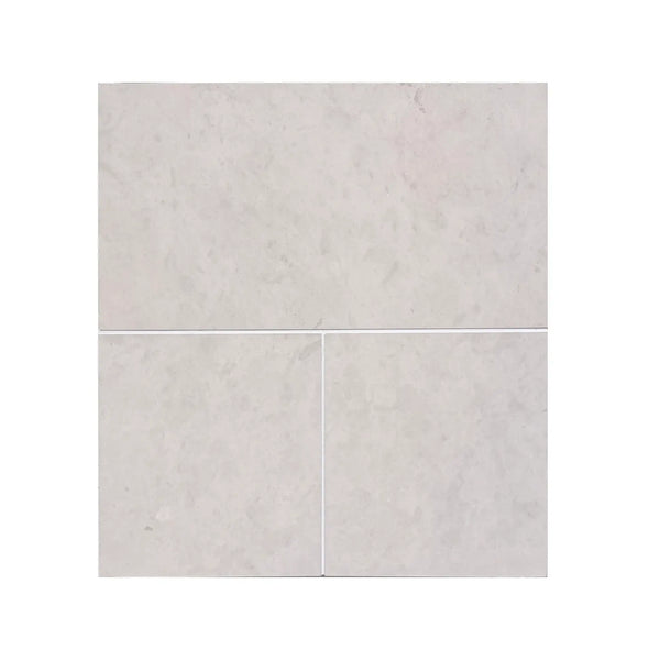 Light gray Dolce Crema 12x12 limestone marble-effect square tiles with subtle veining