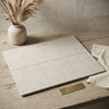 Beige marble-effect ceramic tile sample with subtle veining and matte finish from Dolce Crema 12x24 Limestone collection