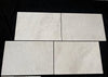 Dolce Crema 18X18 Limestone: four light gray marbled matte tiles