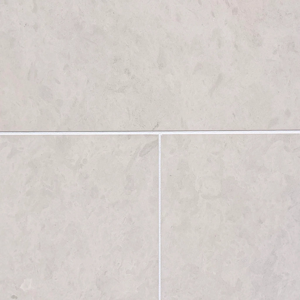 Dolce Crema 18X36 light gray marble-effect limestone tiles with white grout