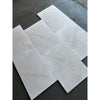 Dolce Ivory 12X24 Limestone light gray tiles with natural stone veining