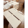Dolce Crema 16x24 limestone tiles stacked on pallets in warehouse