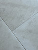 Dolce Ivory 18X36 Limestone Brushed gray concrete tiles with texture and grout
