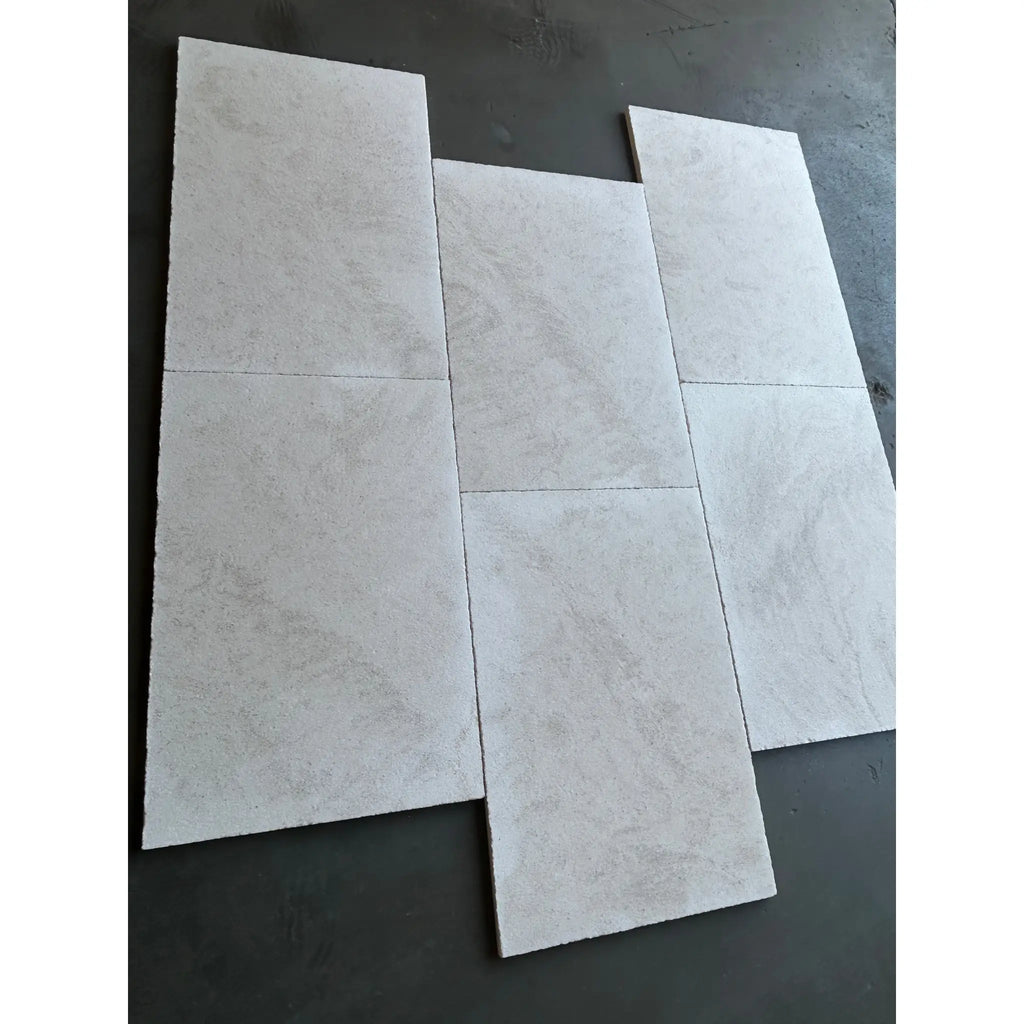 Dolce Ivory 18X36 limestone tile in light gray marbled matte finish