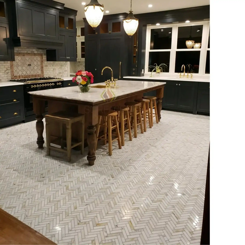 Elegant kitchen with herringbone tile floor.