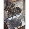 Emperador dark marble 1x3 herringbone mosaic polished tiles in dark brown and black with white veining wrapped in plastic