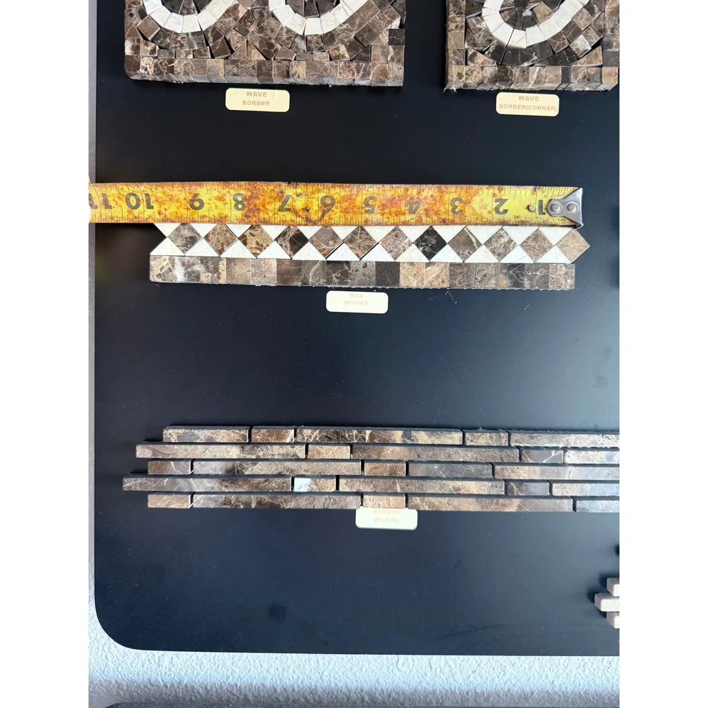 Emperador Dark Marble mosaic tile samples with tape measure, showcasing polished border and dots