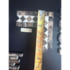 Emperador Dark Marble 2x12 Bias Border with Crema Marfil Dots and tape measure
