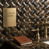 Brown leather-bound book with embossed gold lettering and circular seal for emperador dark marble 3d small-bread mosaic polished