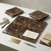 Emperador dark marble 4x4 polished brown Spanish marble tiles with a rich veined pattern for elegant interiors