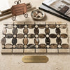 Beige and brown veined Spanish marble mosaic tile with oval and circular patterns Emperador Dark Marble polished border