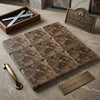 Emperador dark marble 6x6 tumbled tiles in brown with swirling golden veining arranged in a nine tile grid