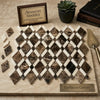 Spanish marble mosaic tile featuring a polished lattice pattern of Emperador Dark and Crema Marfil stones