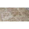 Polished marble floor tiles featuring Emperador Light Marble 3X6 Tumbled design
