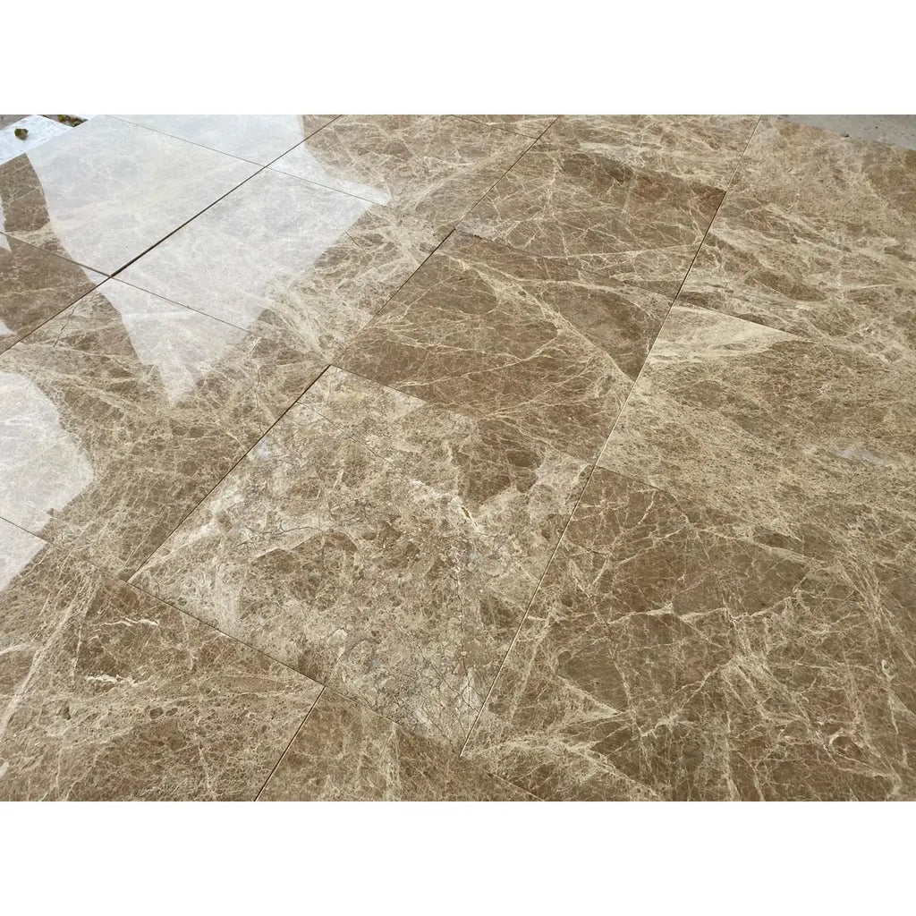 Polished brown marble floor tiles from Emperador Light Marble 4x4 Tumbled collection