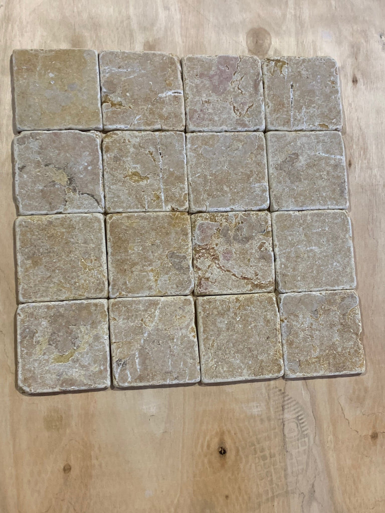 19th century French stone paving tiles in weathered gray and brown hues with rustic design for Giallo Reale Marble 4x4 Tumbled Tile