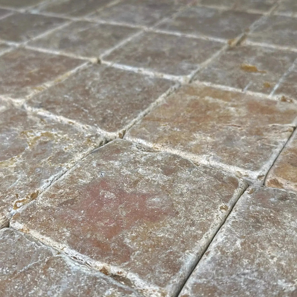 Square stone floor tiles in Giallo Reale Marble, ideal for elegant decor