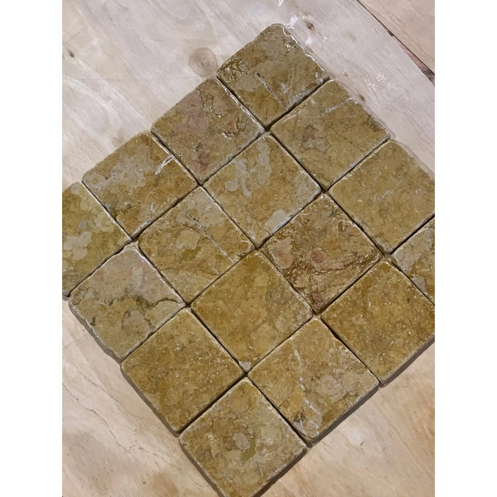 Travertine mosaic tile coaster set with natural stone texture in Giallo Reale Marble tones