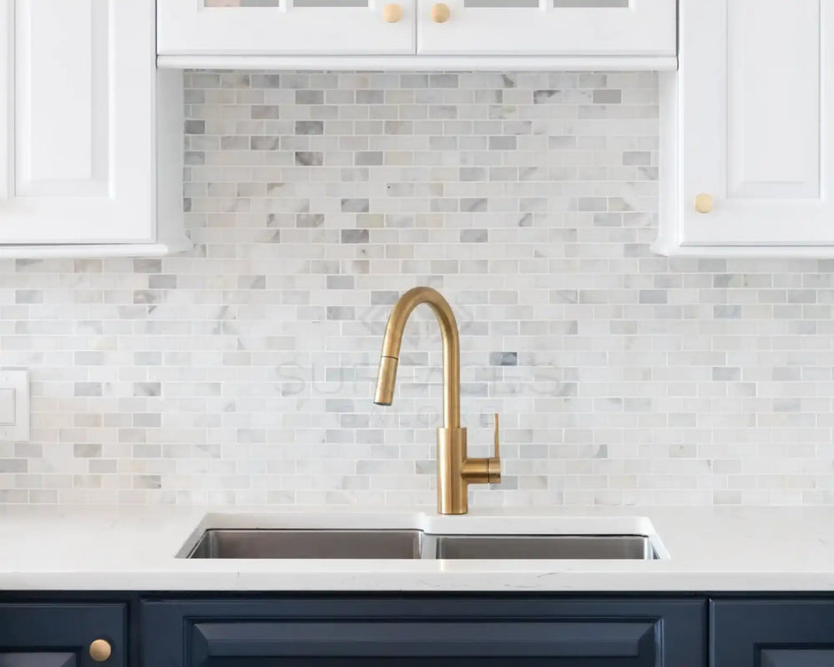 Gold kitchen faucet.