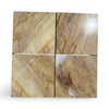 Four square light brown Golden Horizon Marble 12x12 polished tiles with dark brown and white veining