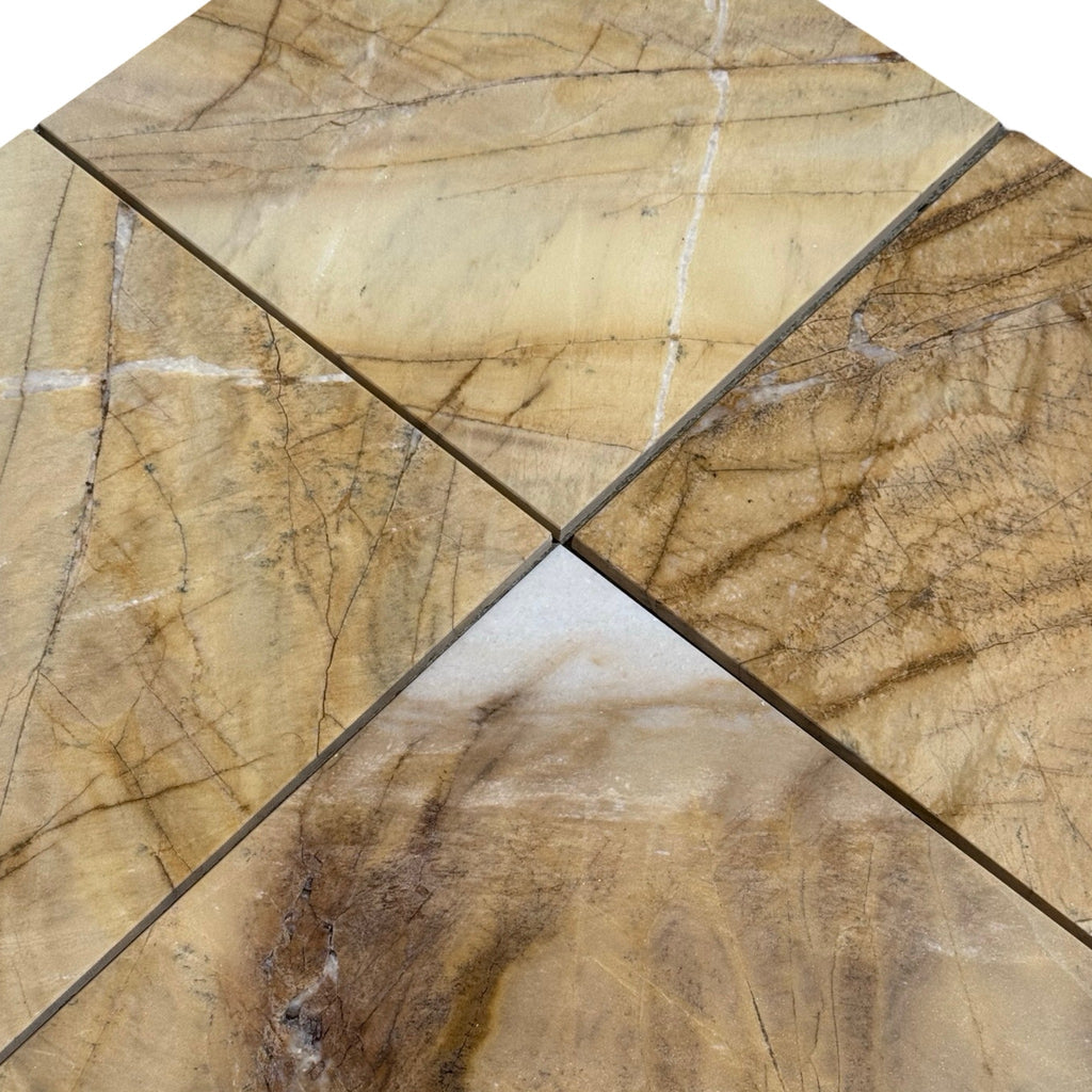 Four triangular Golden Horizon Marble tiles arranged to form a square, polished finish