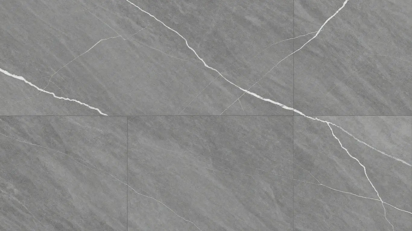 Bardiglio marble tiles with gray and white veining.