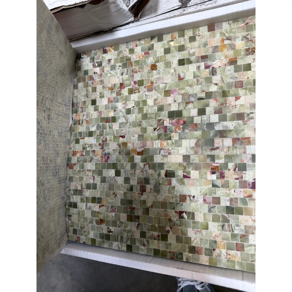 Polished Green Onyx 3/8x3/8 staggered tight-joint mosaic wall with veined tiles