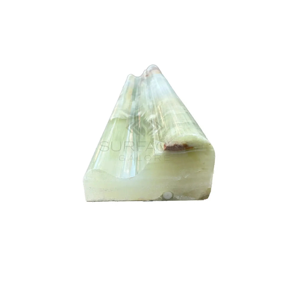 Translucent green onyx triangle in Green Onyx Crown Mercer Molding Liner Polished