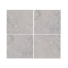 Four square Greyhaven 12x12 limestone honed tiles with gray marble veining