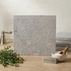 Greyhaven 12x12 limestone honed gray marble countertop slab with subtle veining and smooth polished finish