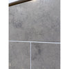 Gray marble-effect 12x12 honed limestone wall tiles with subtle veining and white grout