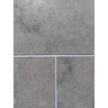 Greyhaven 12x24 honed limestone tiles with gray stone, subtle veining, matte finish, and thin white grout