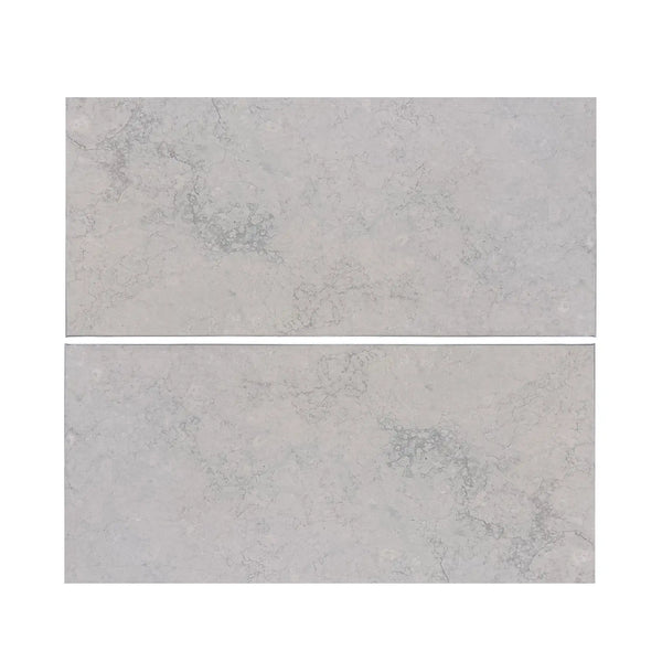 Greyhaven 12x24 honed limestone tiles in gray marble effect with subtle veining