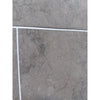 Greyhaven 18x18 honed limestone tile with gray marble veining and white grout