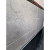 Greyhaven 18x18 honed limestone tile with gray textured stone, subtle veining, matte finish