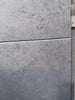 Greyhaven 18x18 honed limestone tile with gray textured speckled finish and grout lines