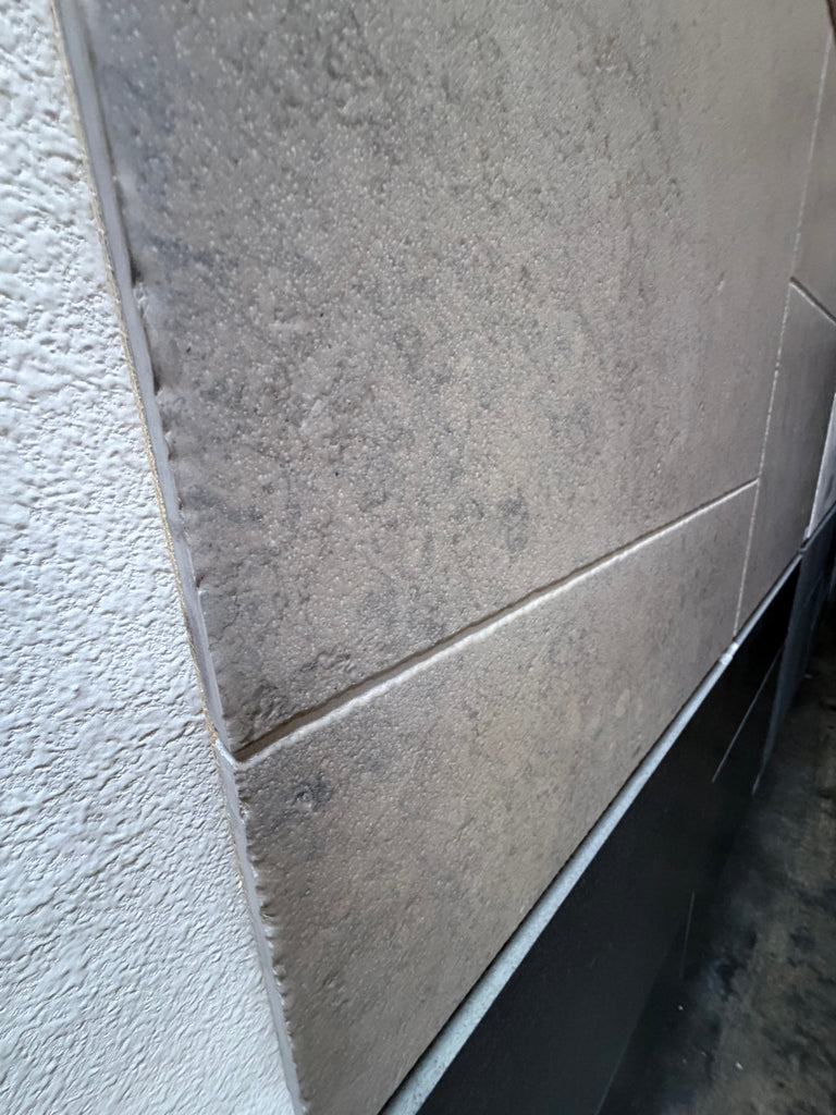 Greyhaven 18x18 honed limestone tiles with gray texture and matte finish