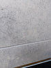 Greyhaven 18x18 limestone honed tile with gray textured wall, subtle speckles, matte finish