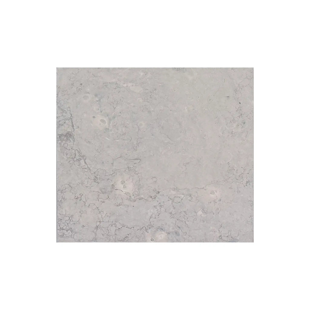 Greyhaven 18x18 honed limestone tile in light gray marble with subtle veining