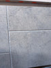 Greyhaven 24x24 honed limestone tiles in gray textured matte finish