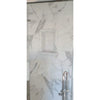 Hand Made Marble Shampoo Niche in a marble-tiled shower with recessed shelf