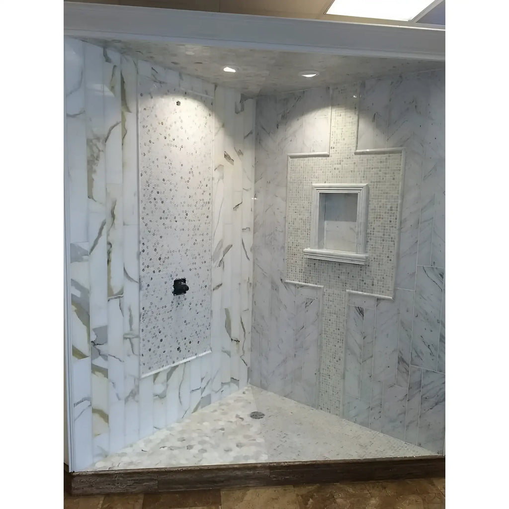 Modern tiled shower featuring a Hand Made Marble Shampoo Niche for elegant storage